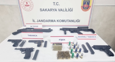 Şok operasyon! Vitrin arkasında gizli oda ve silahlar çıktı